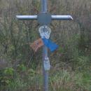 Wayside cross at place of road accident of STS Sanok in Gniewoszówka (23.01.1995)b