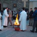 098 Sanok, Diacons preparing to light the Christ candle prior to Easter Vigil mass, 2010